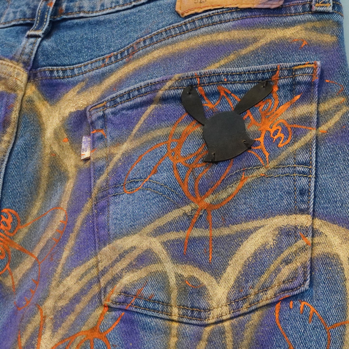 SKOLOCT SPRAY PAINTED JEANS - 33