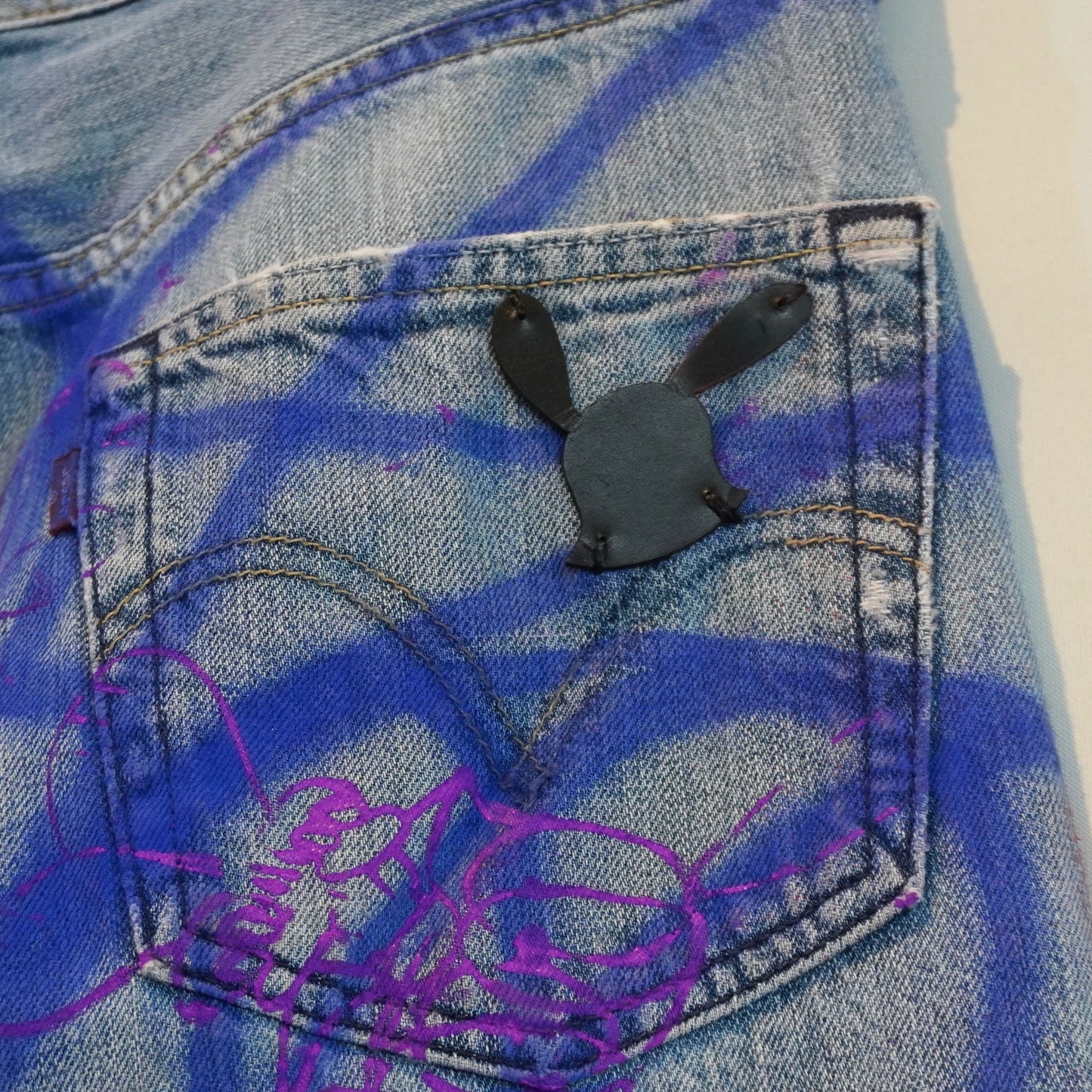 SKOLOCT SPRAY PAINTED JEANS - 32
