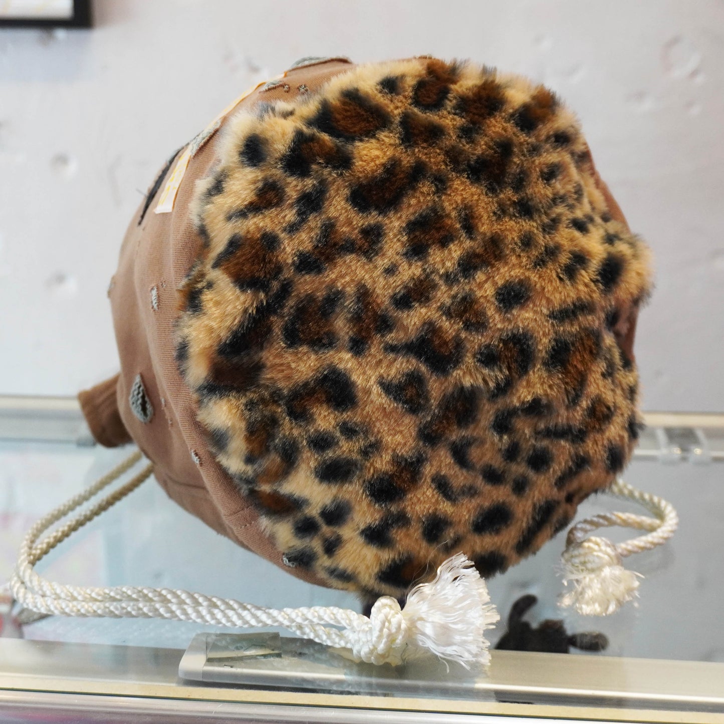 SKOLOCT DISTRESSED MONEY BAG - BROWN (LEOPARD)