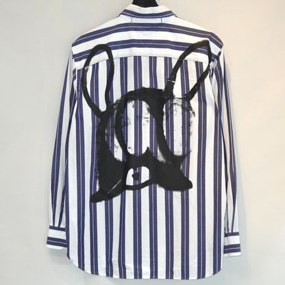 SKOLOCT SKOO FACE REMAKE SHIRT