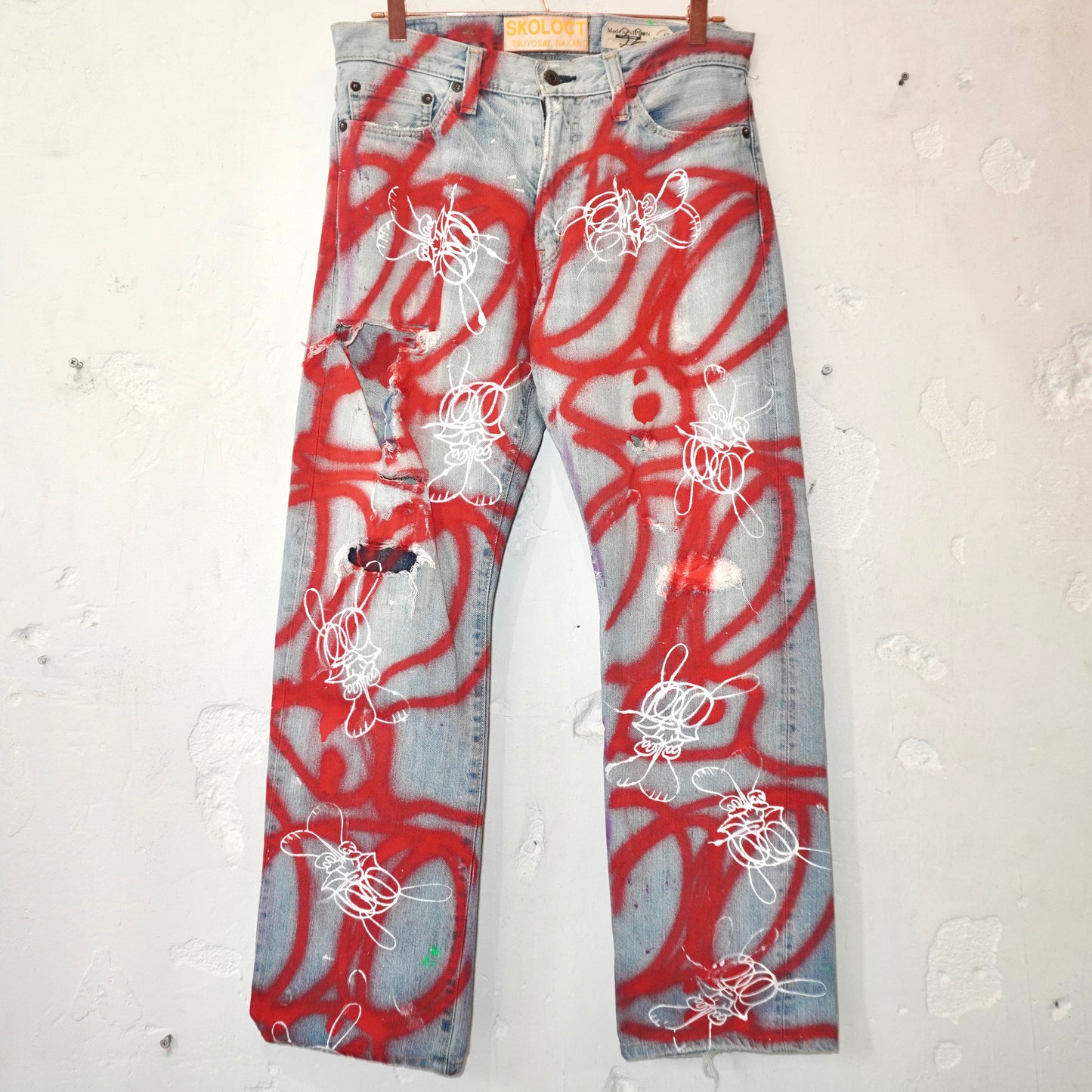 SKOLOCT SPRAY PAINTED JEANS - 32