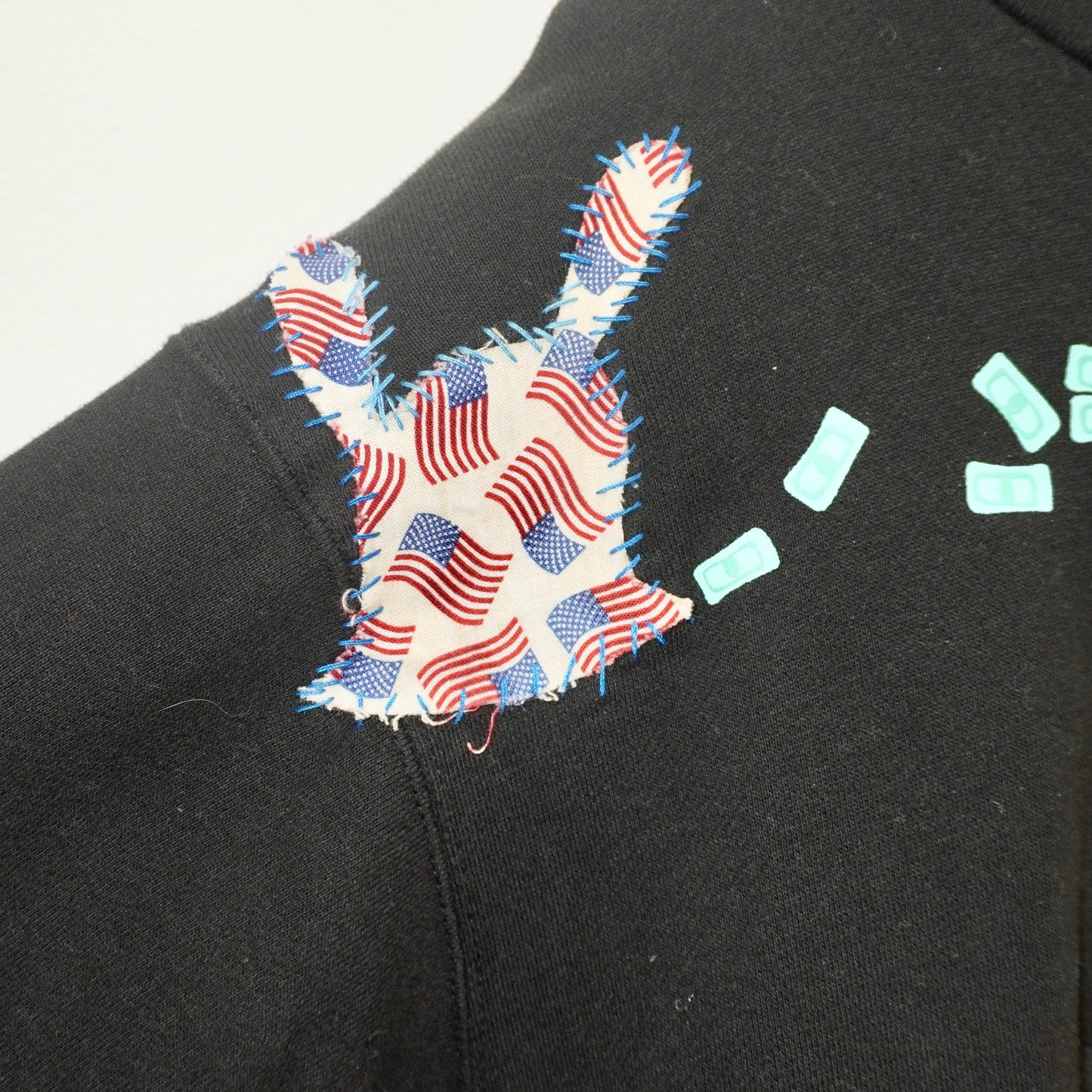 SKOLOCT $BAG PATCH WORK HOODIE