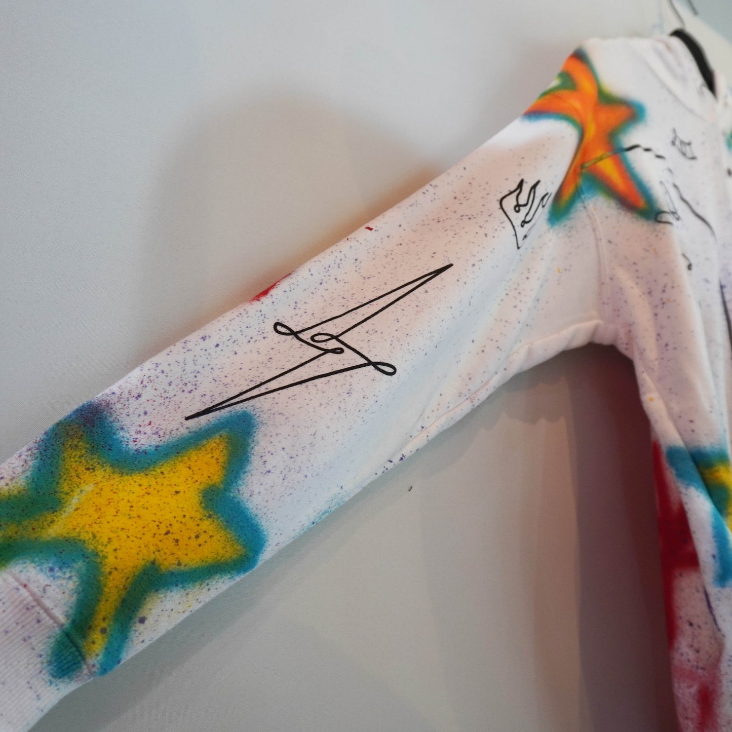 SKOLOCT SPRAY PAINTED REWORKED HOODIE (L)