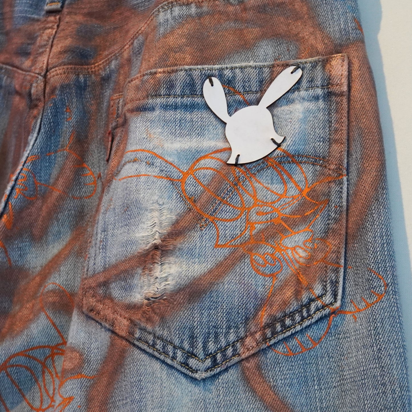 SKOLOCT SPRAY PAINTED JEANS - 32