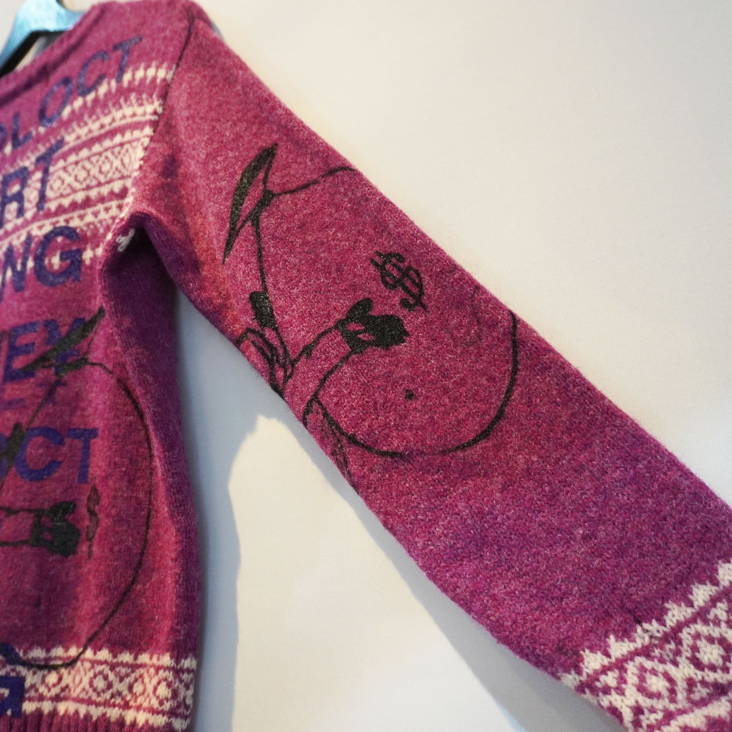 A SKOLOCT ORIGINAL DOLLAR REMAKE KNIT SWEATER